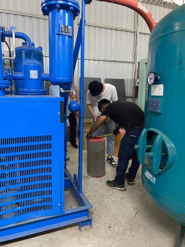 Biomedical engineers servicing an oxygen plant in Kambong Cham, Cambodia