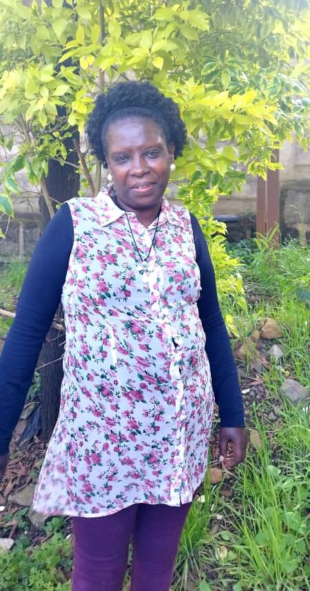 A nurse posing for a photo